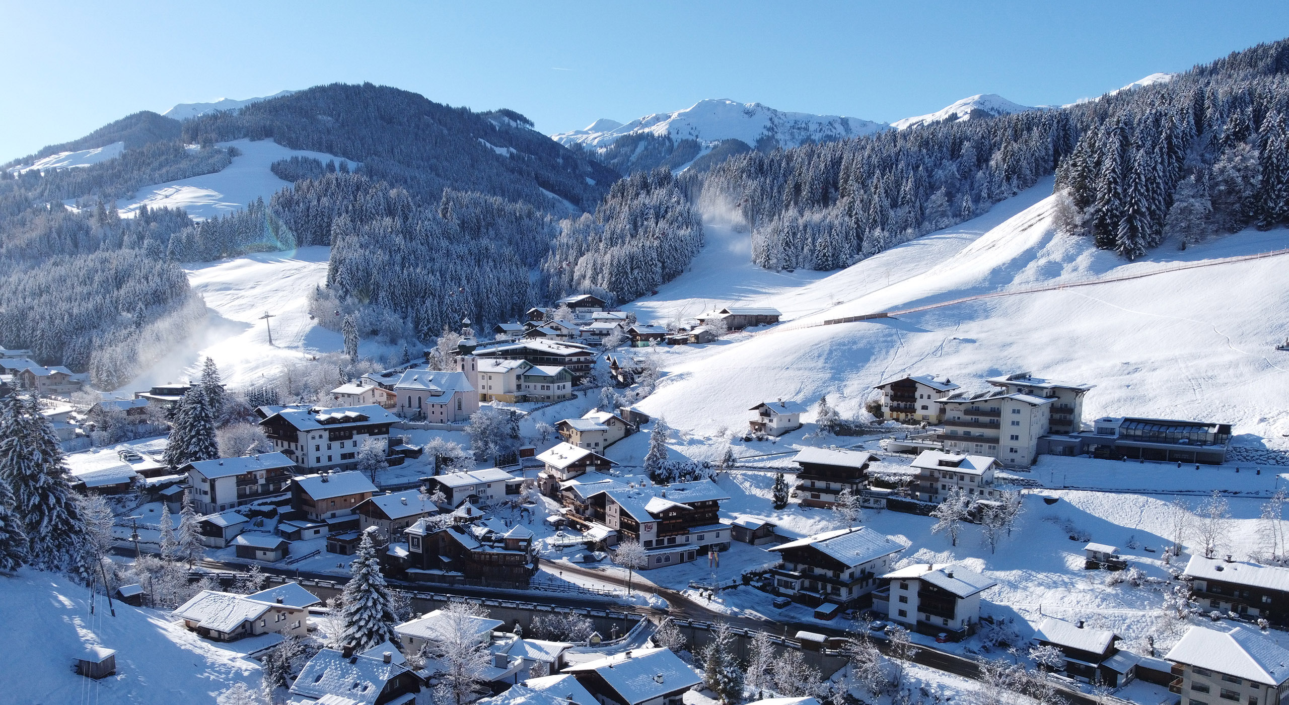 Winter landscape in Auffach, Tyrol, with snow-covered village and Hotel Platzl