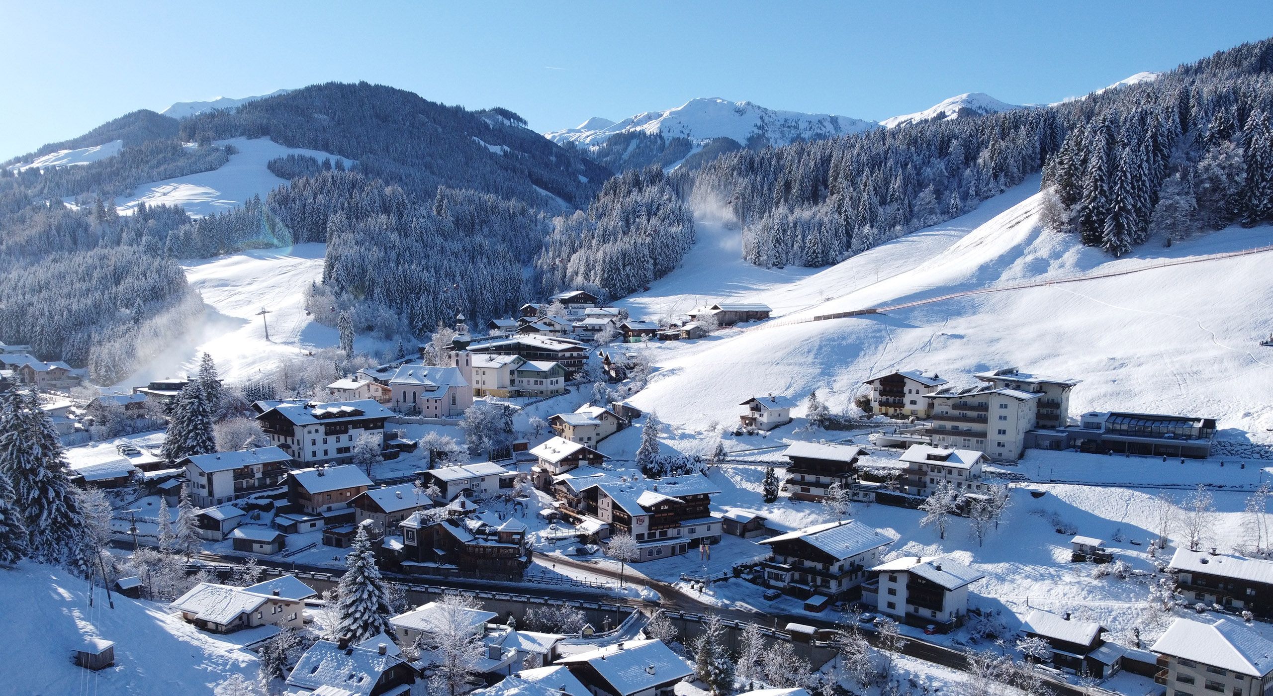 Winter landscape in Auffach, Tyrol, with snow-covered village and Hotel Platzl